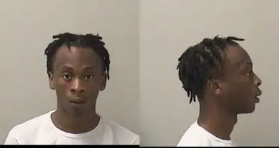 Three charged in armed robbery shooting near Aurora
