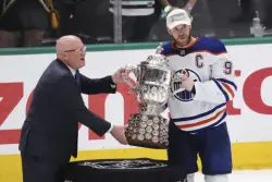 Oilers gladly touched West trophy ahead of Cup rematch. It was hands off for Panthers in the East